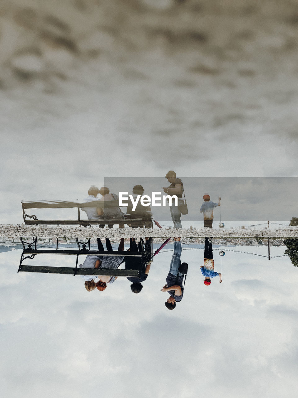 LOW ANGLE VIEW OF AIRPLANE FLYING OVER SNOW AGAINST SKY