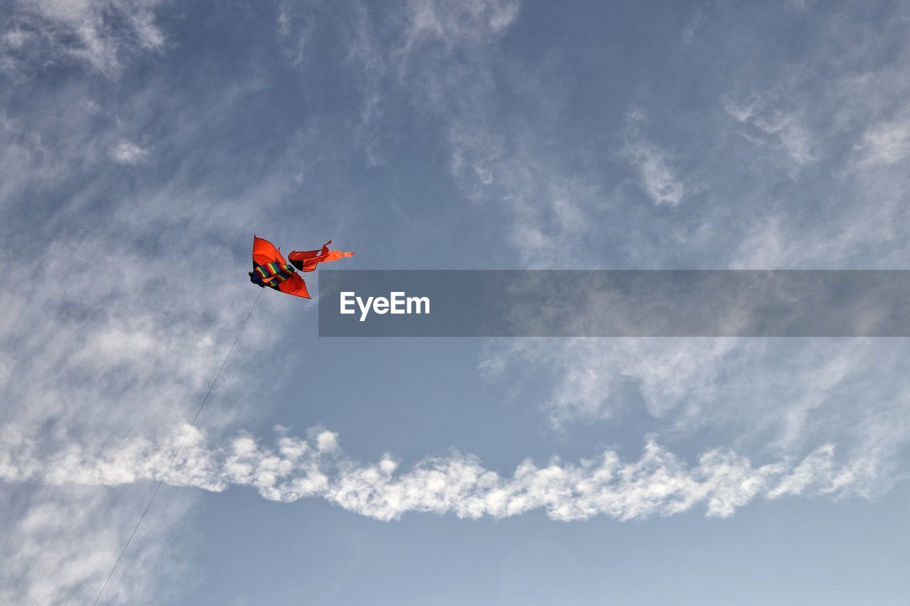 LOW ANGLE VIEW OF KITE IN SKY