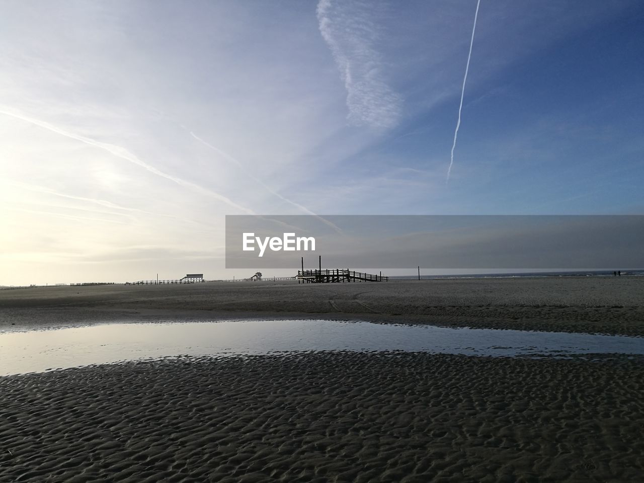 PANORAMIC VIEW OF BEACH AGAINST SKY