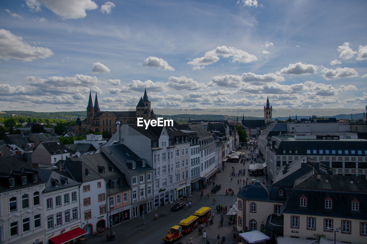 High angle view of street amidst buildings in city