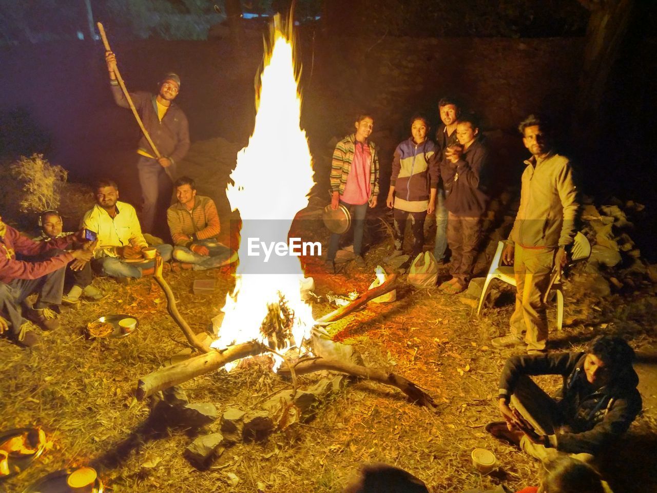 MEN IN ILLUMINATED TRADITIONAL CLOTHING