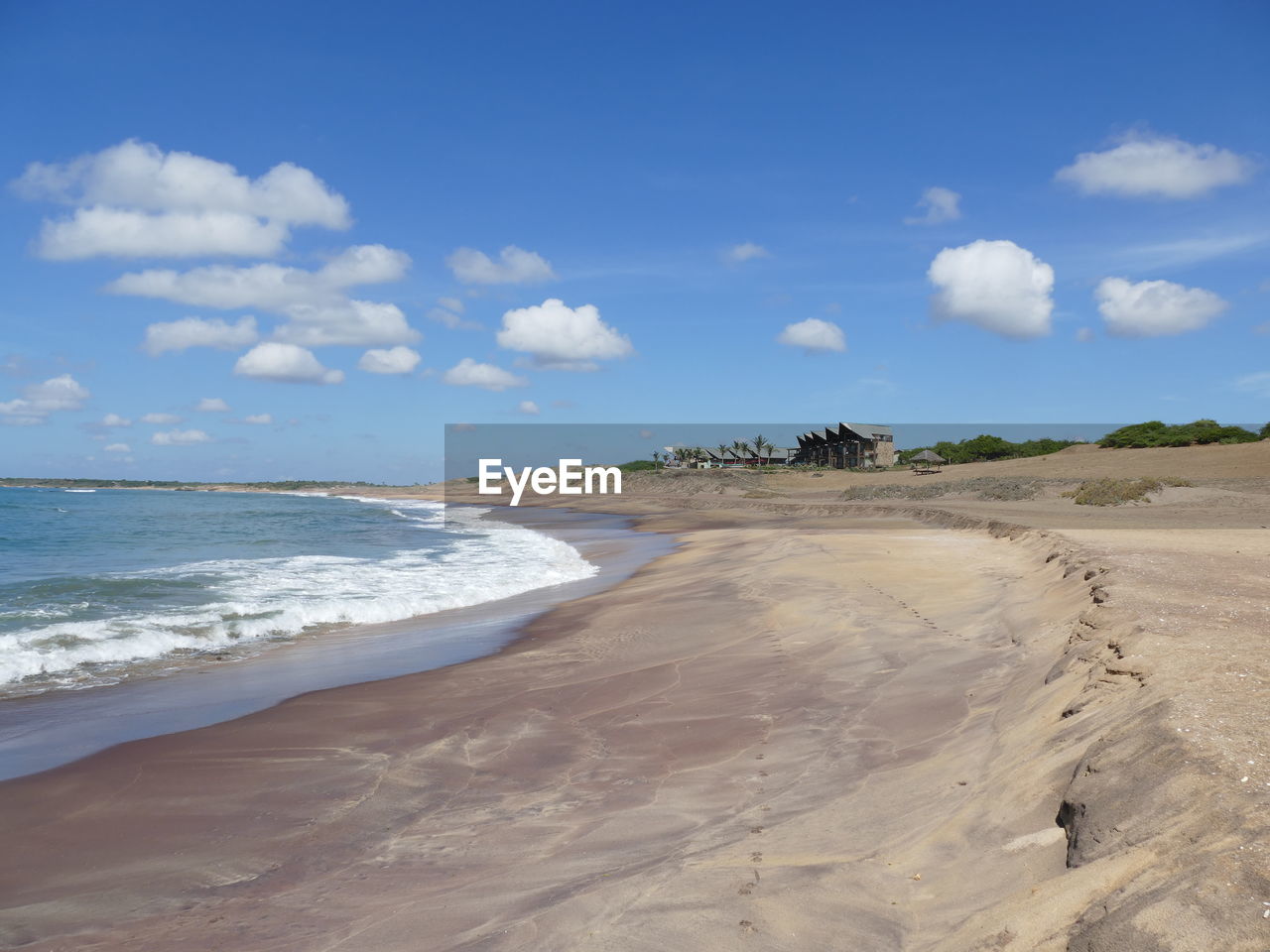 VIEW OF BEACH AGAINST SKY