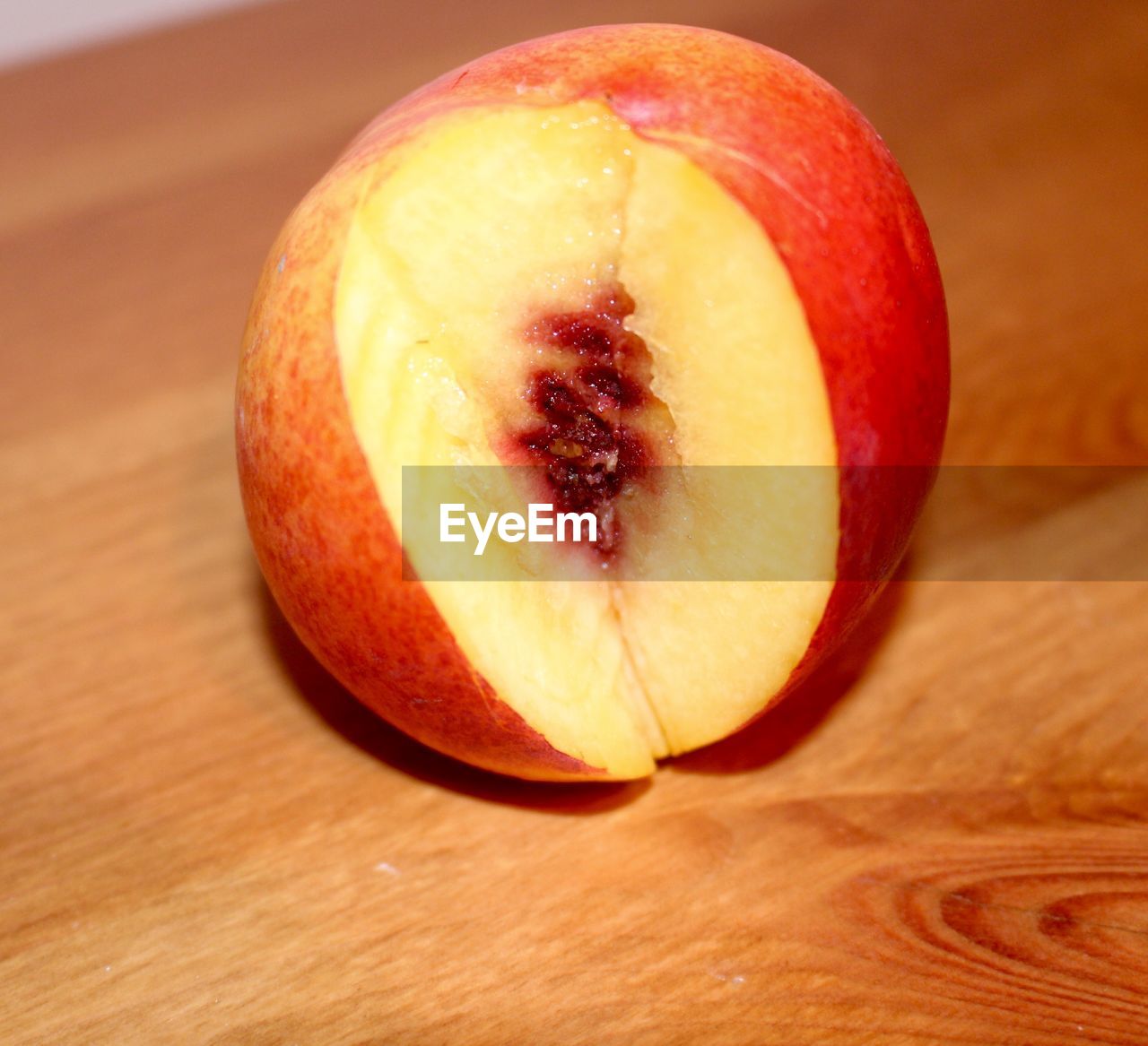 Close-up of rotten apple on table