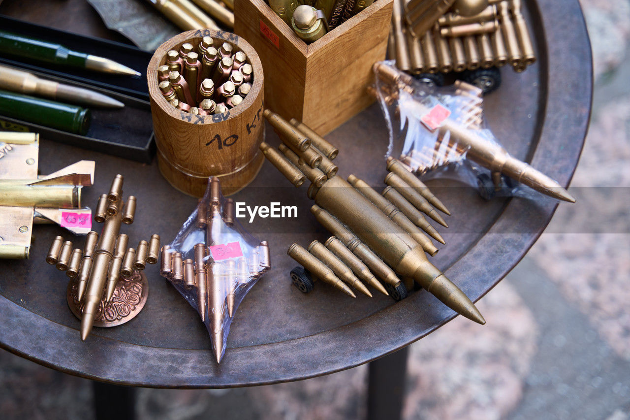 high angle view, no people, weapon, tradition, wood, large group of objects, still life, iron, variation, food and drink