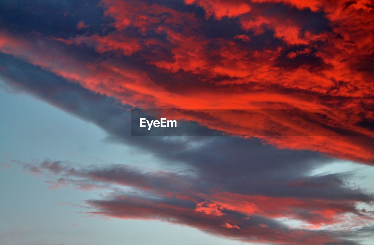 Low angle view of clouds in sky during sunset