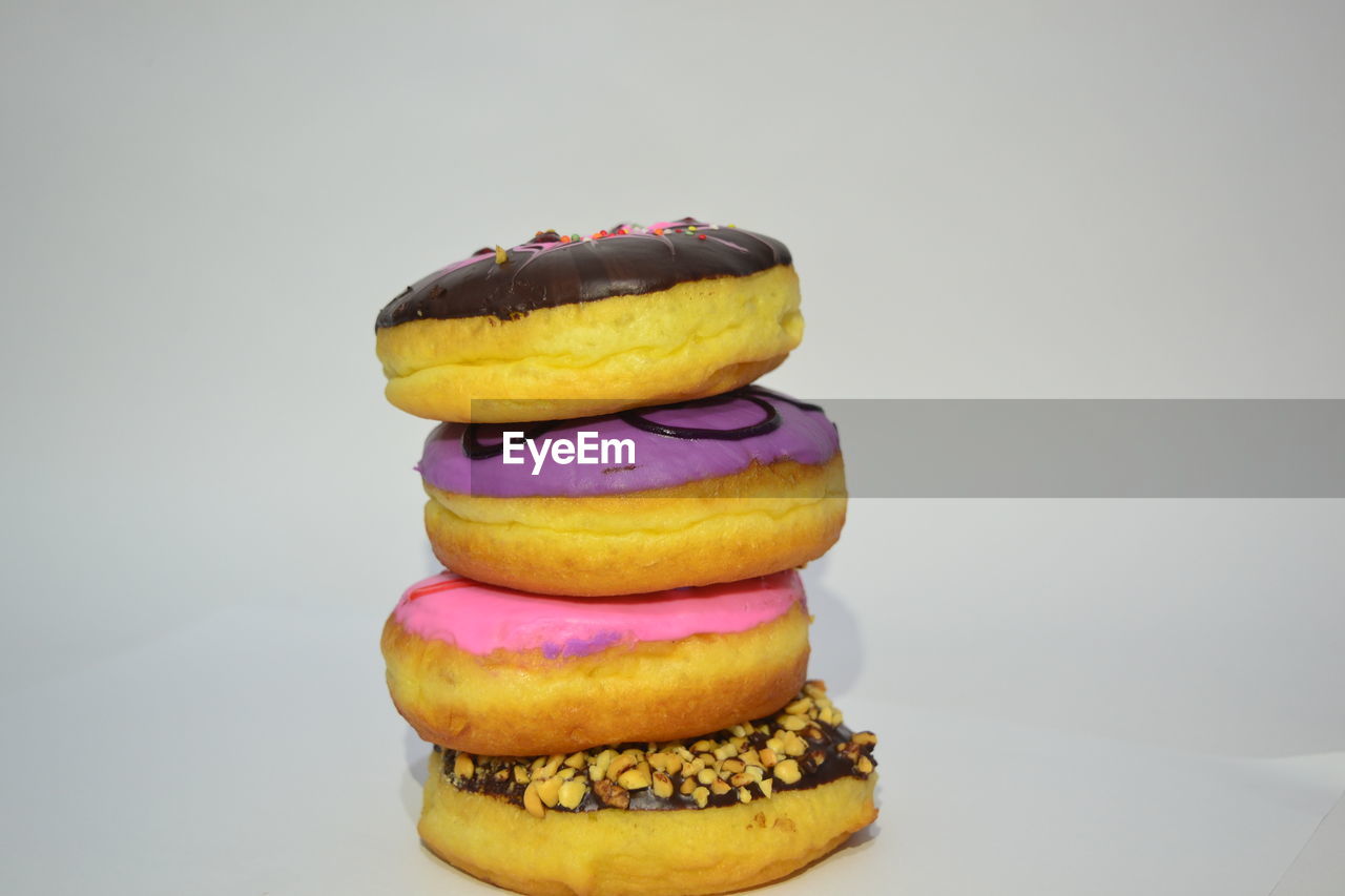 Close-up of cake against white background