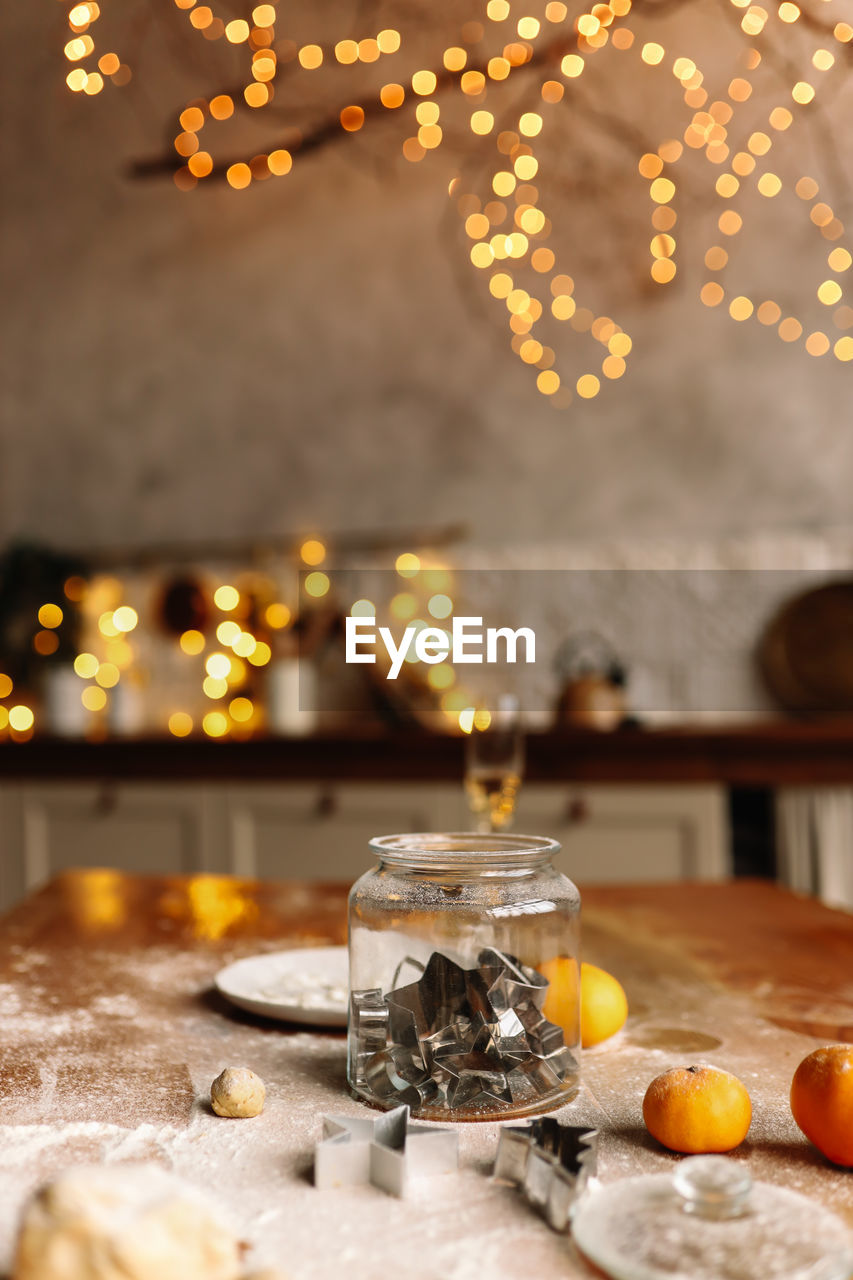 The interior of a christmas decorated kitchen in the loft style in a cozy house