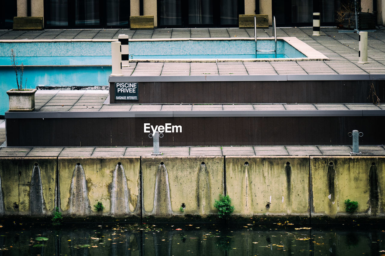 Run-down and abandoned swimming pool 