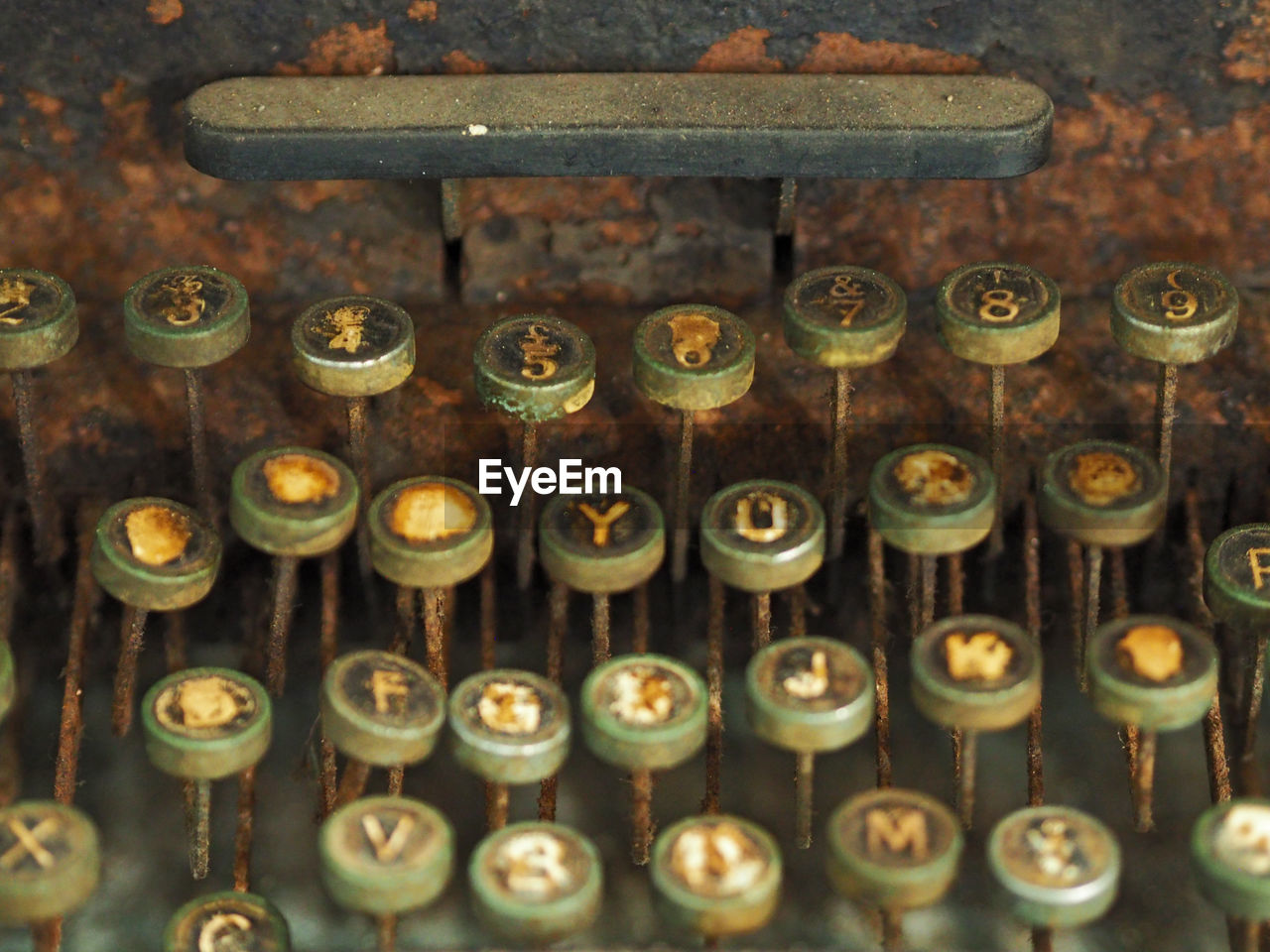 High angle view of rusty typewriter