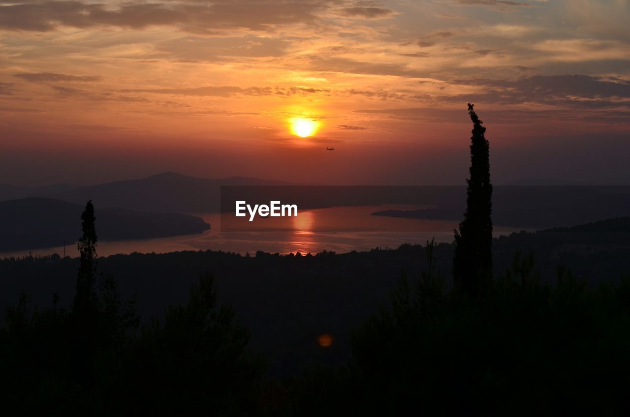 Scenic view of sunset over sea