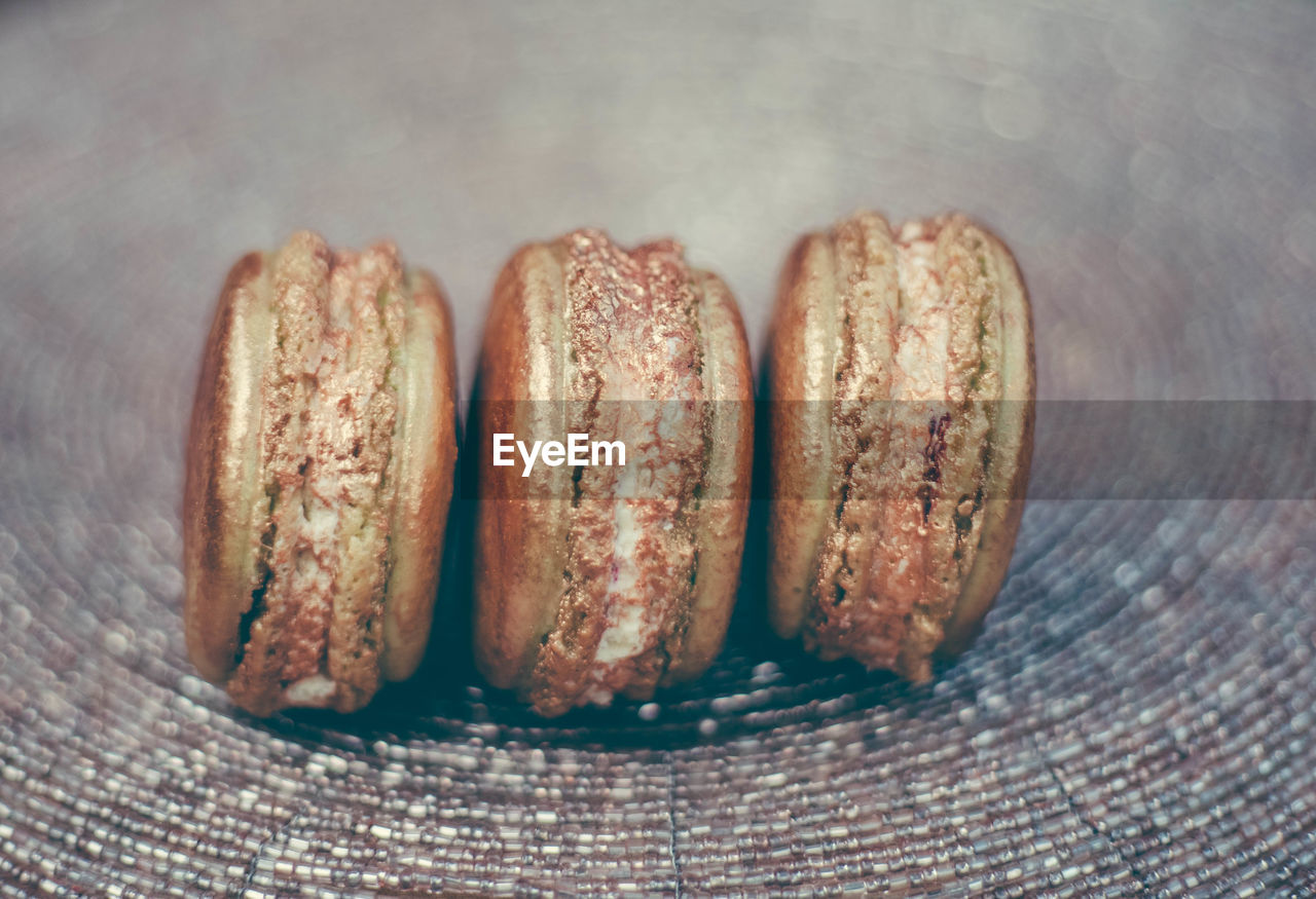 HIGH ANGLE VIEW OF BREAD IN CONTAINER ON TABLE