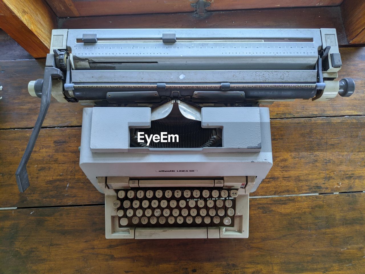 office supplies, typewriter, office equipment, wood, indoors, technology, table, no people, retro styled, high angle view, communication