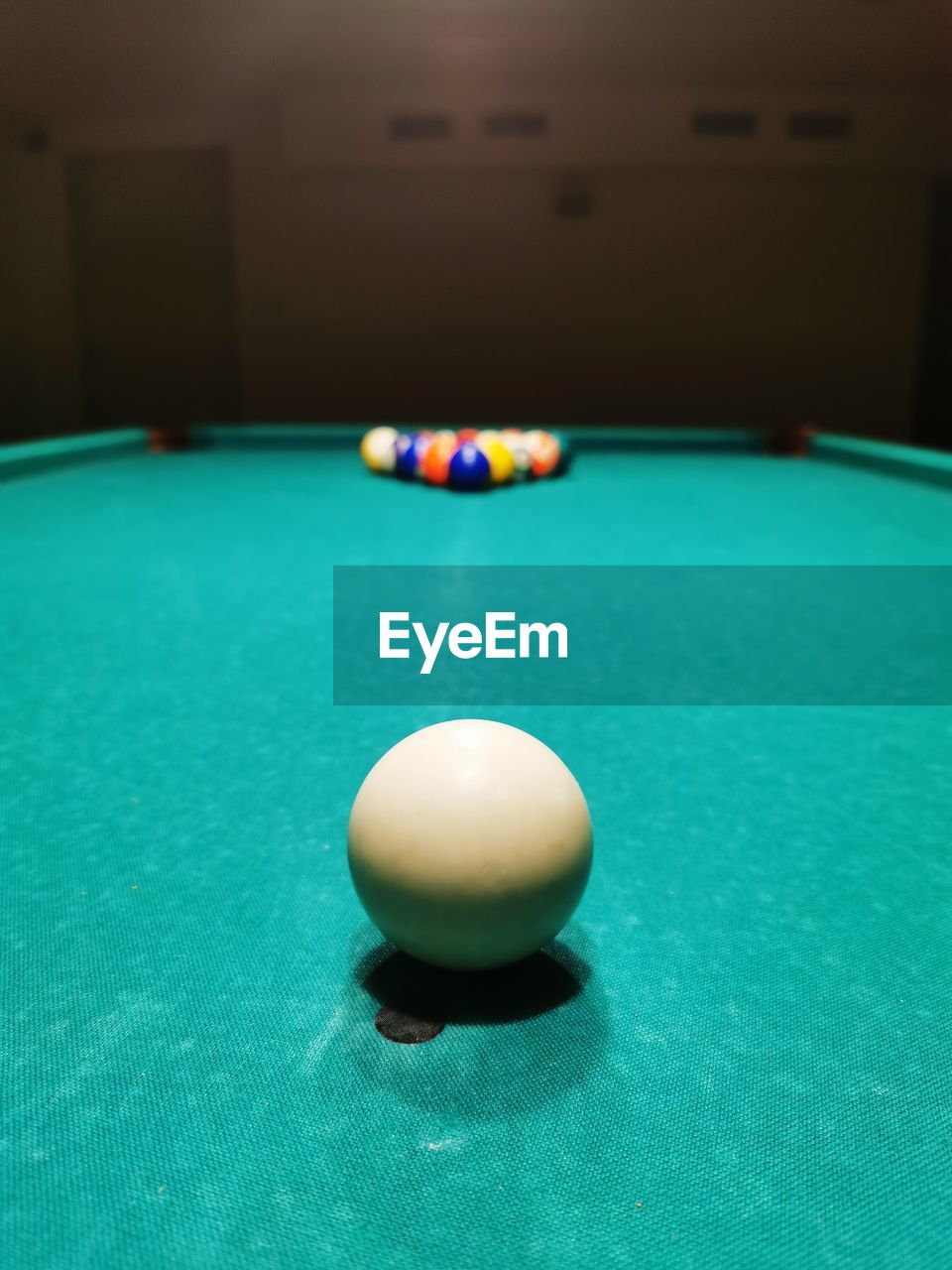 Close-up of ball on table, snooker game