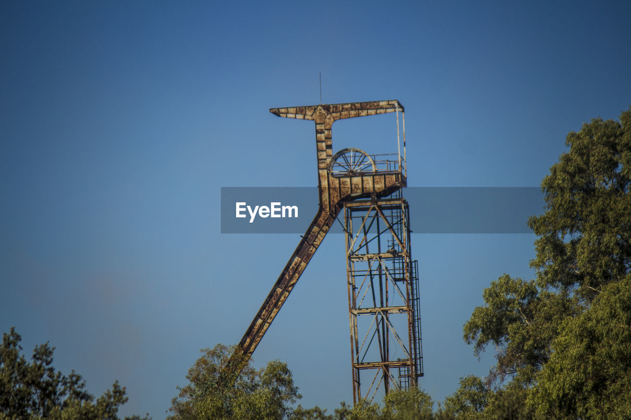 LOW ANGLE VIEW OF TOWER AGAINST SKY