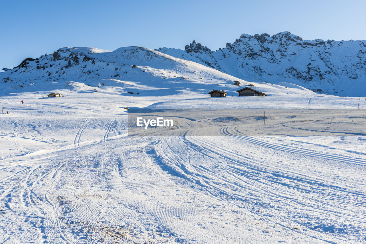 Scenic view of snow covered mountain against sky