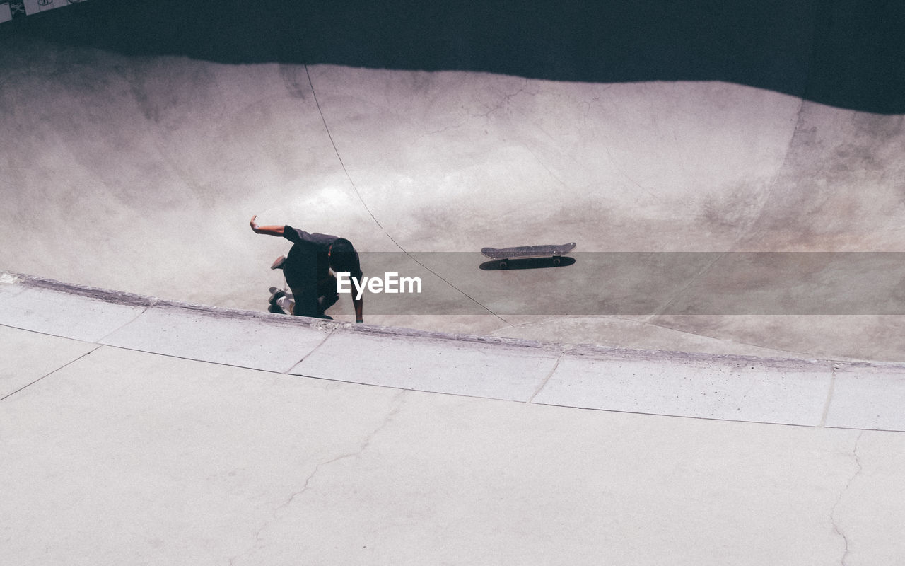 High angle view of man standing on venice skatepark