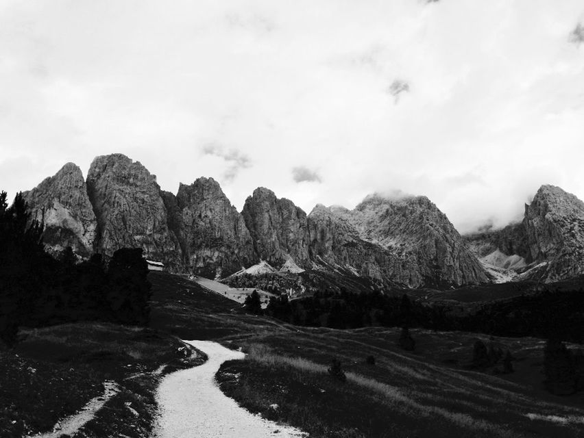 ROAD PASSING THROUGH MOUNTAINS