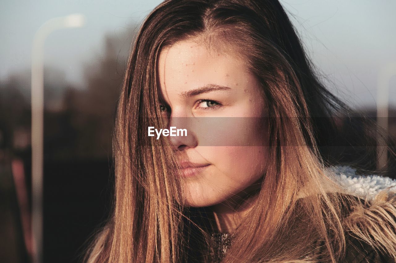 Close-up portrait of young woman