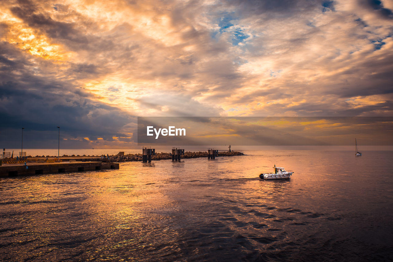 Scenic view of sea against sky during sunset