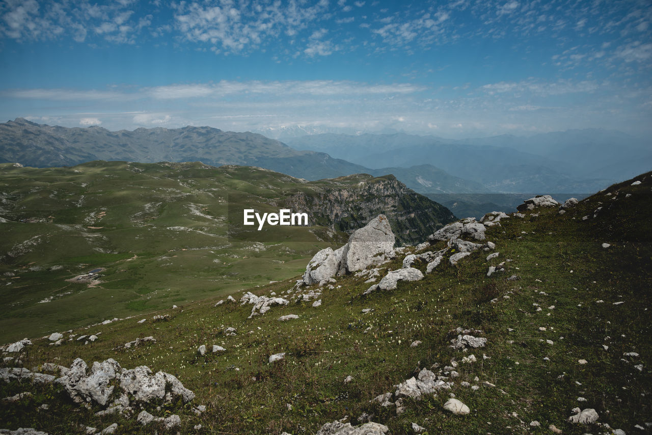 Scenic view of rocky mountains against sky