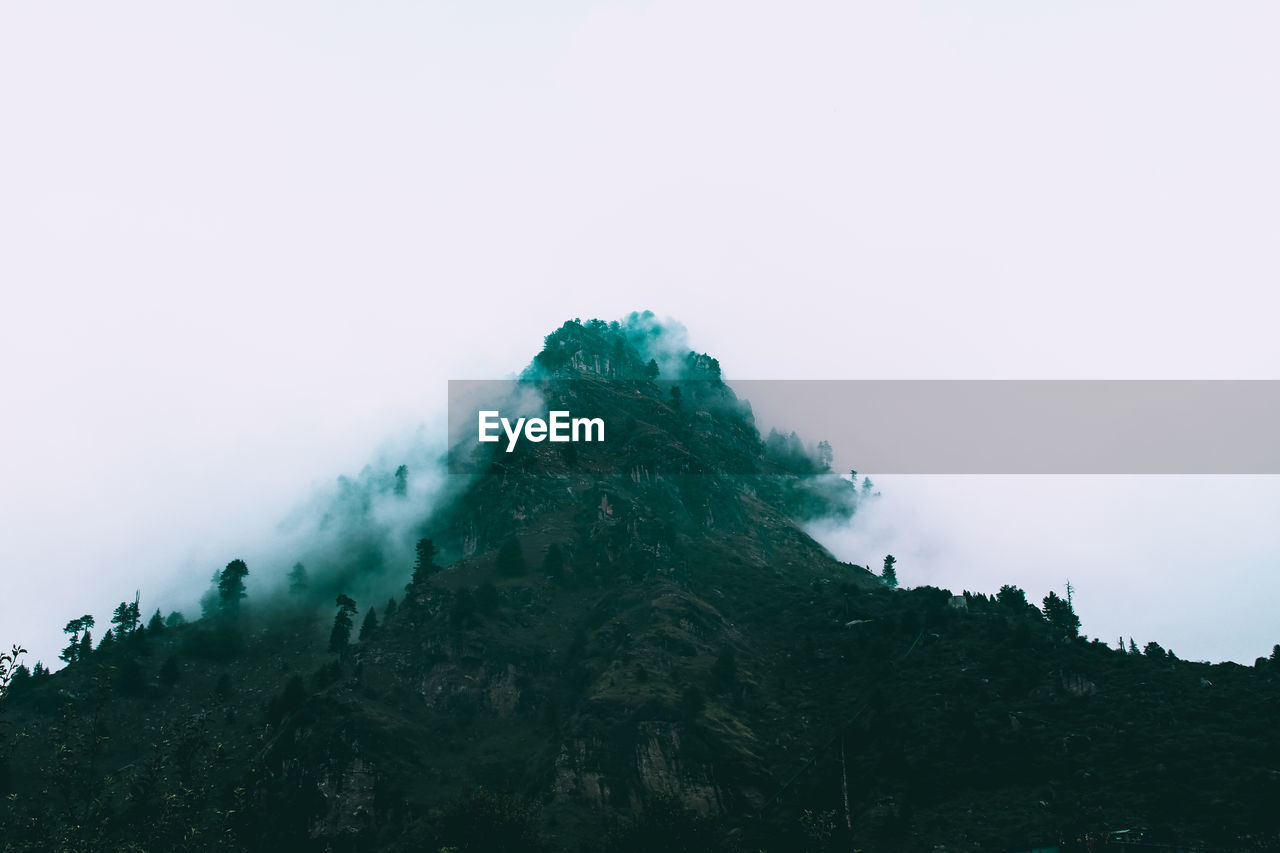 Low angle view of mountain against sky