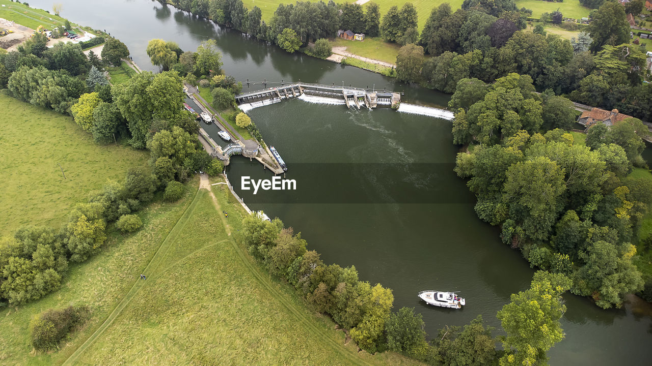 An aerial view of the weir on the river thames at mapledurham in oxfordshire, uk