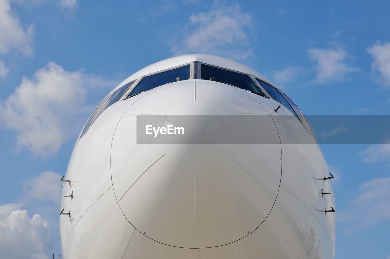 LOW ANGLE VIEW OF BUILT STRUCTURE AGAINST BLUE SKY