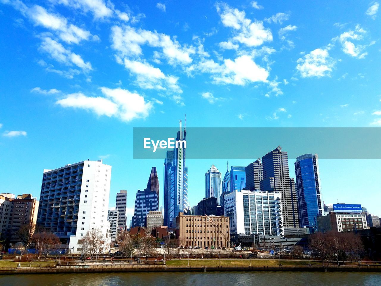 View of skyscrapers against blue sky