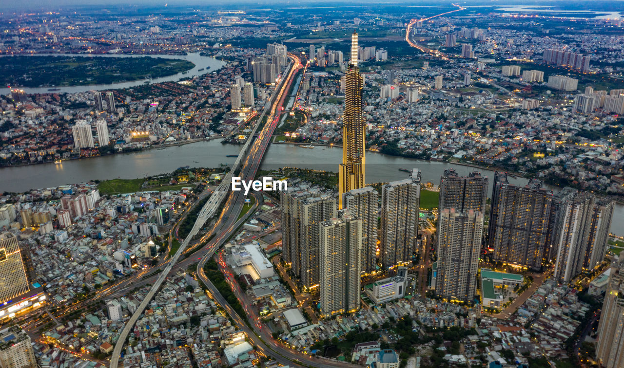 HIGH ANGLE VIEW OF CITY BUILDINGS AT WATERFRONT