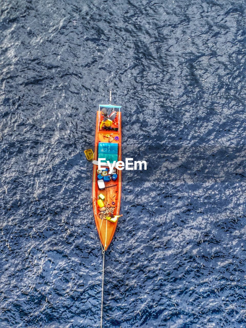 High angle view of people in boat on sea