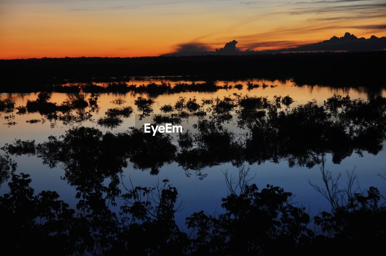 SUNSET OVER LAKE