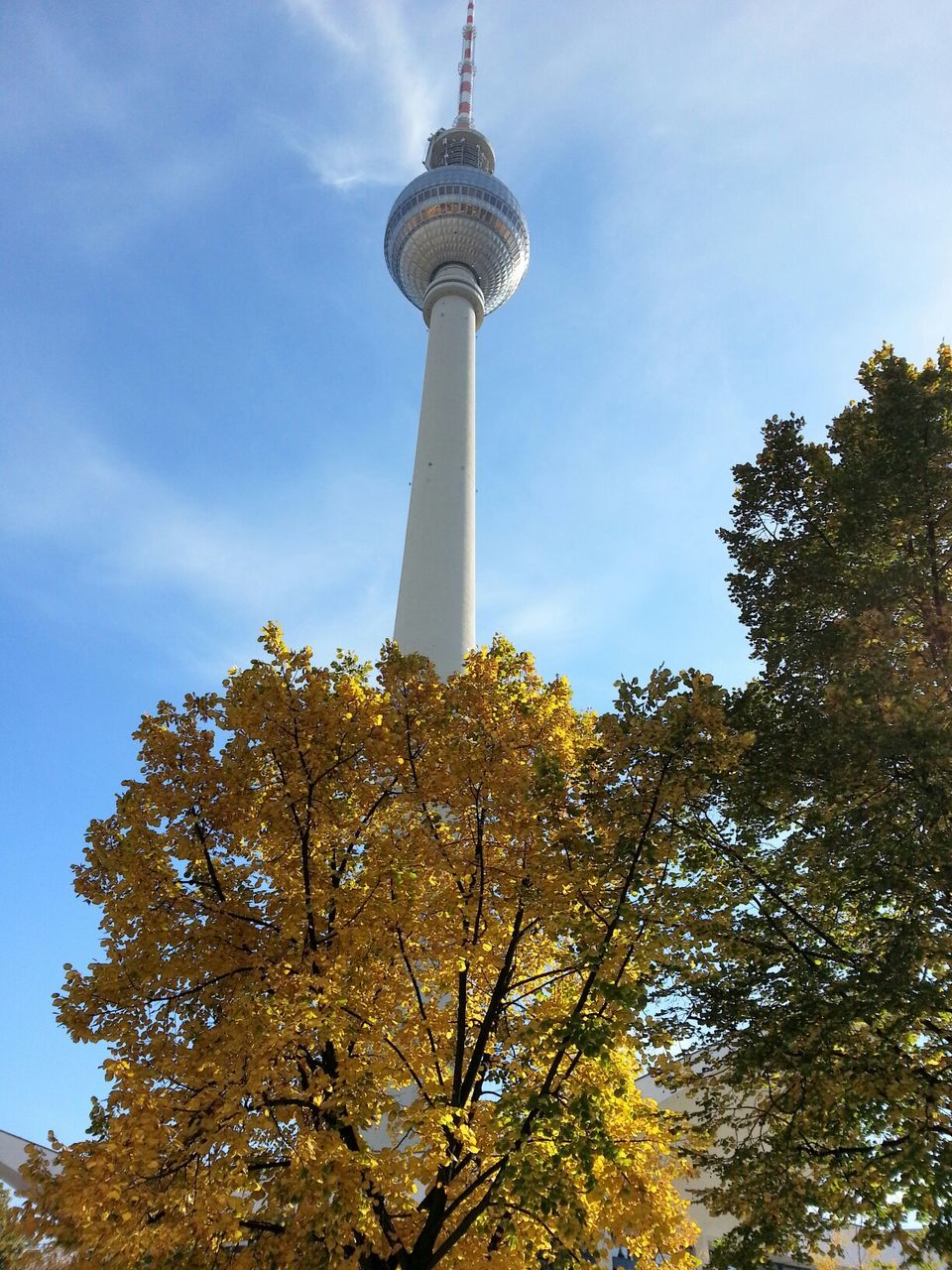 Low angle view of fernsehturm against sky