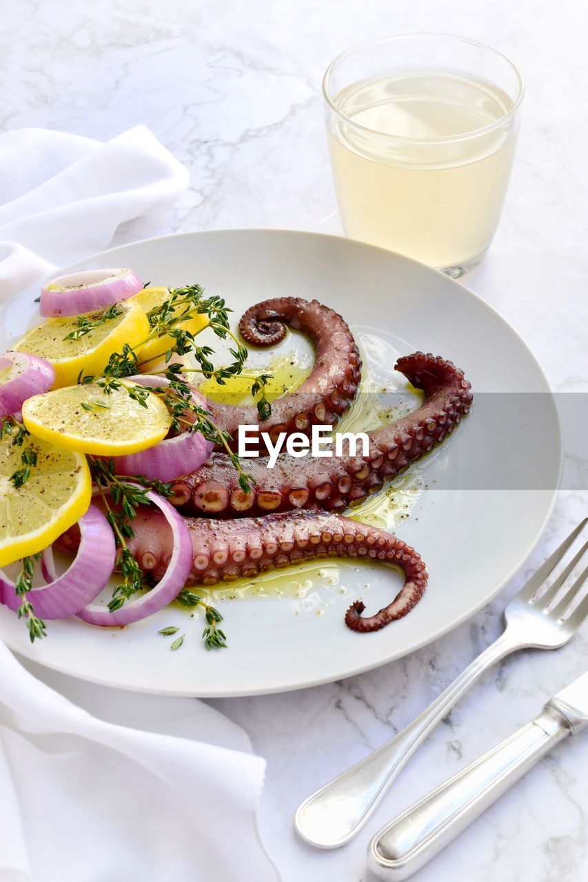 High angle view of octopus served on table