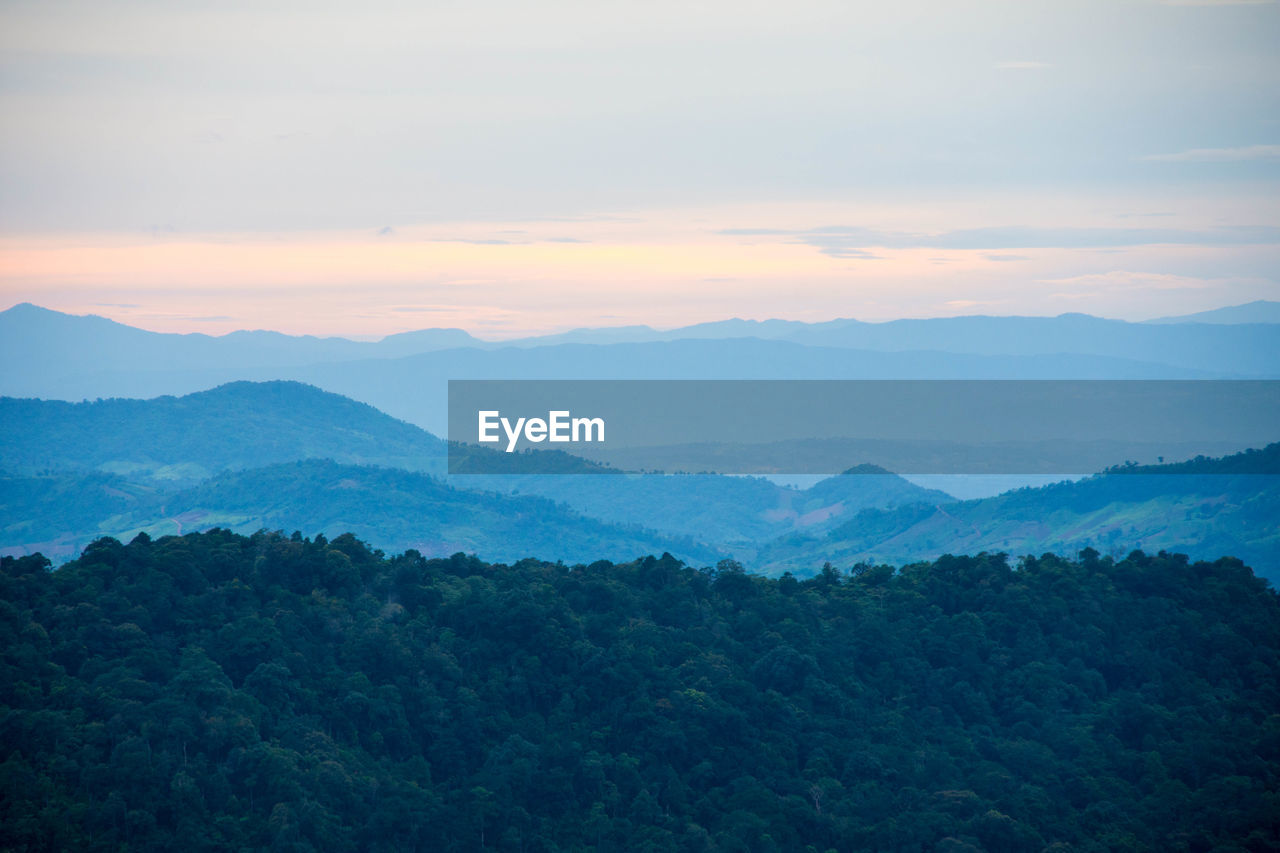 Scenic view of landscape against sky during sunset