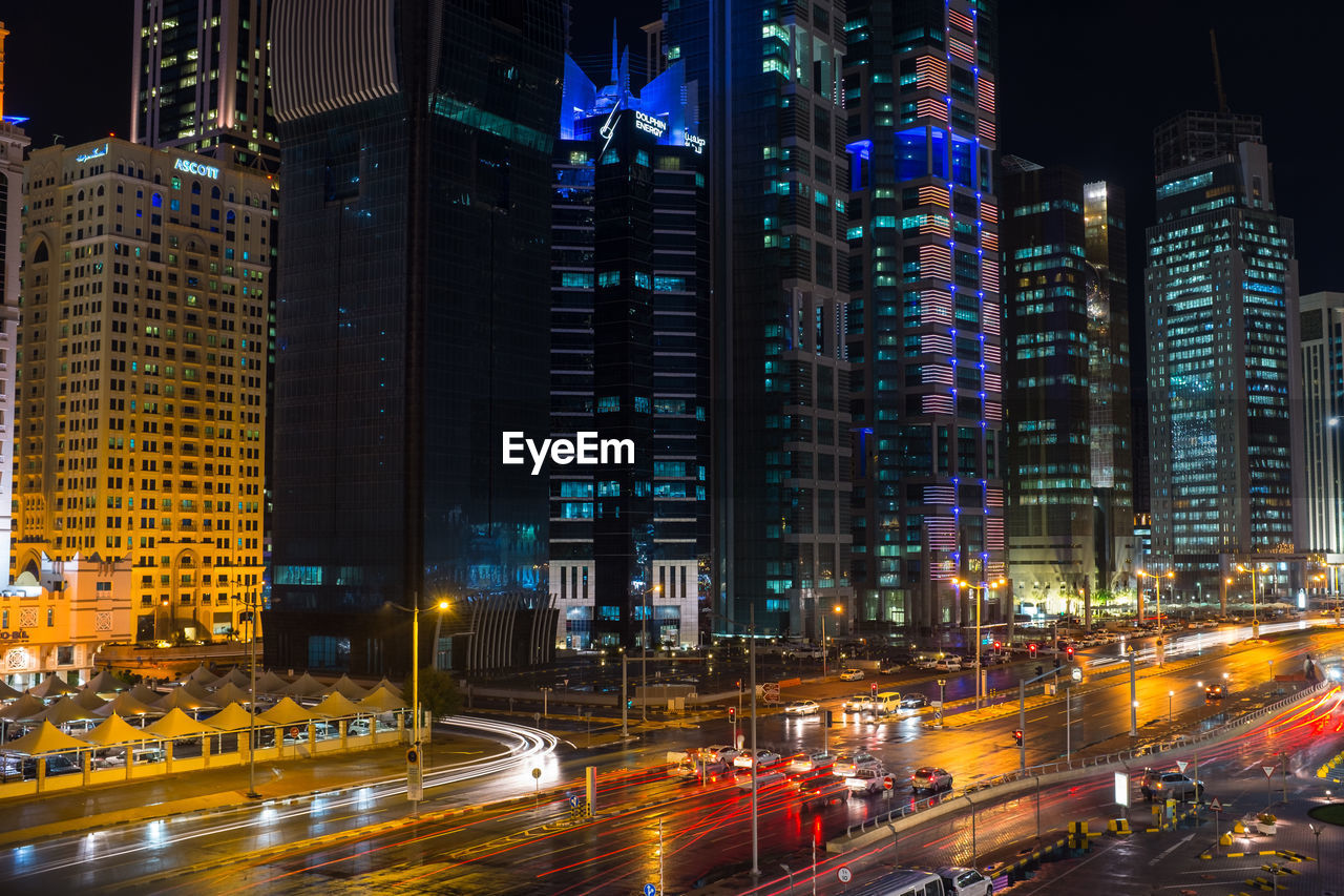 Aerial view of city lit up at night