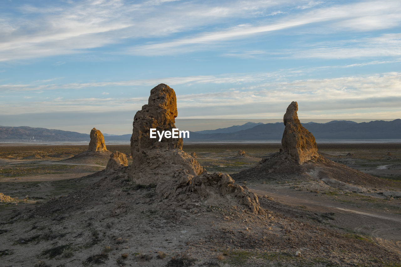 Trona pillars during sunrise against blue sky