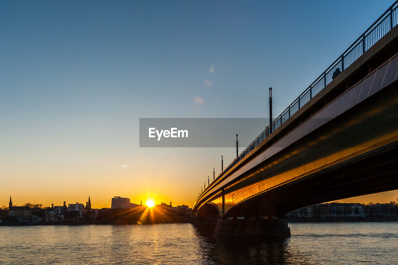 View of suspension bridge at sunset