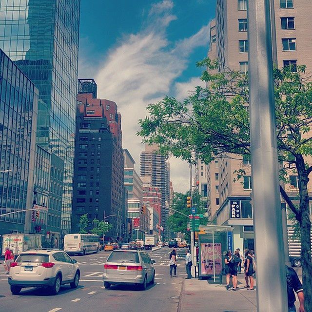 VIEW OF CITY STREET AGAINST SKY