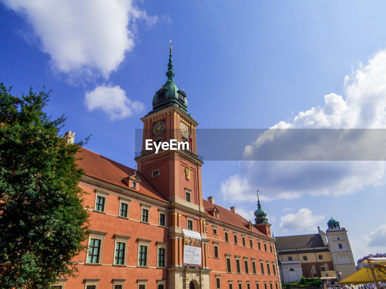 architecture, building exterior, built structure, building, sky, city, landmark, town, cloud, travel destinations, tower, nature, the past, history, clock tower, travel, tree, cityscape, clock, tourism, blue, time, downtown, plant, château, low angle view, urban area, no people, outdoors, old, day, residential district, neighbourhood, religion, town square, place of worship, seat of local government, house