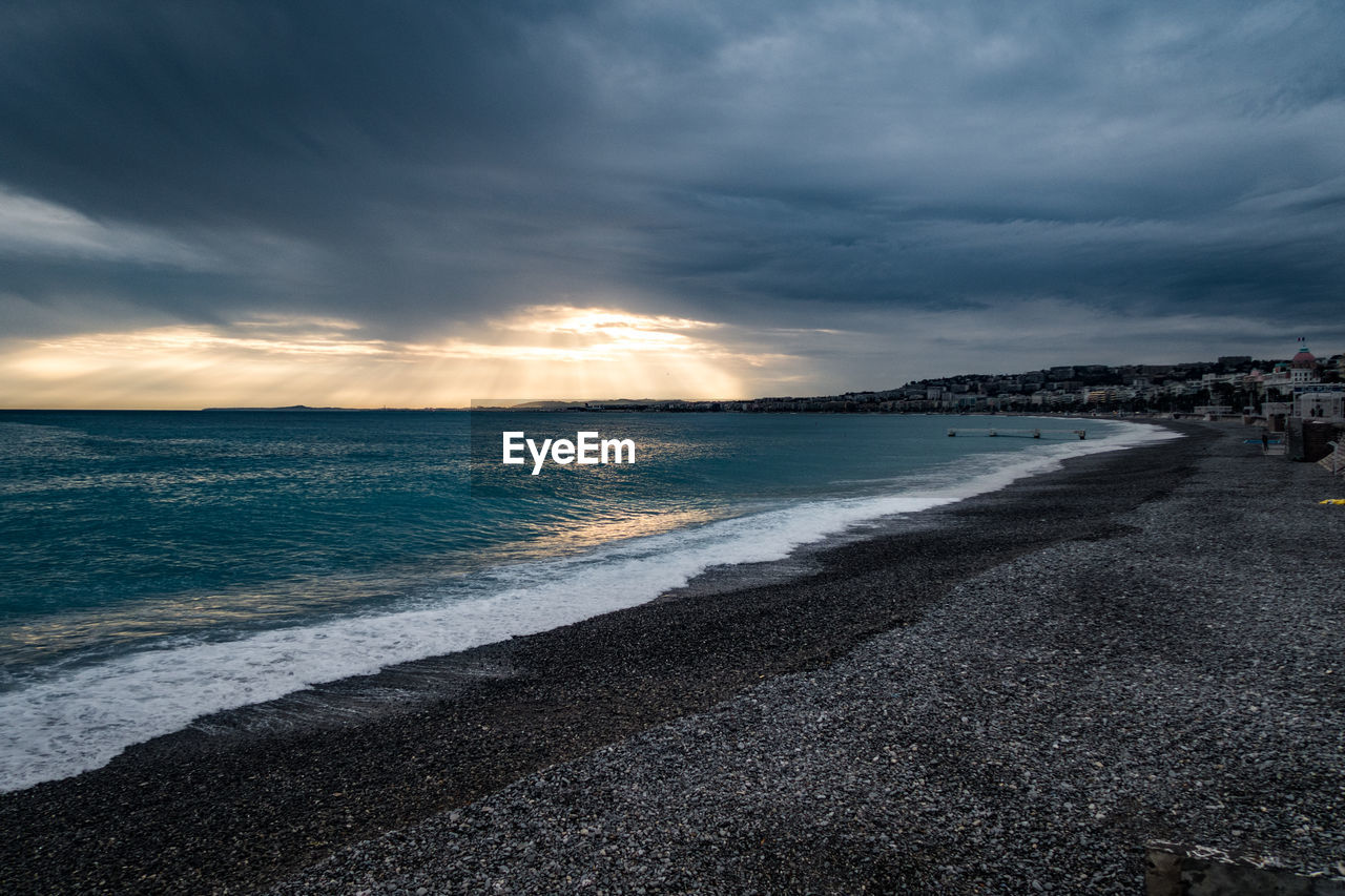 Scenic view of beach against sky