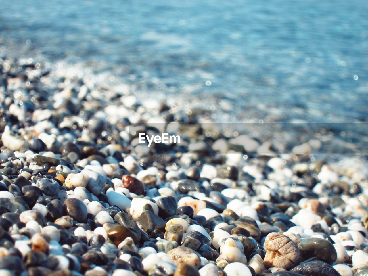 Close-up of pebbles on beach