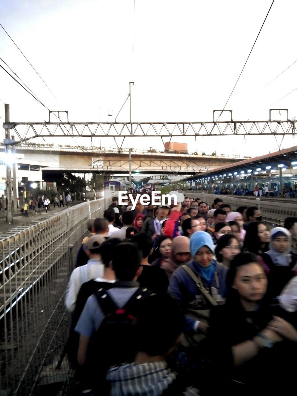 PEOPLE ON RAILROAD TRACK