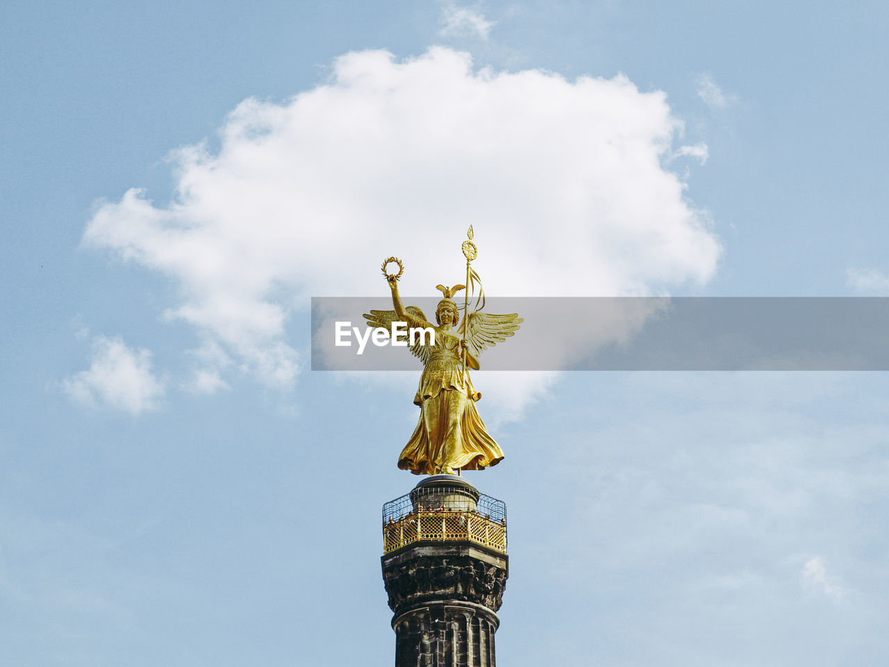 LOW ANGLE VIEW OF ANGEL STATUE AGAINST SKY