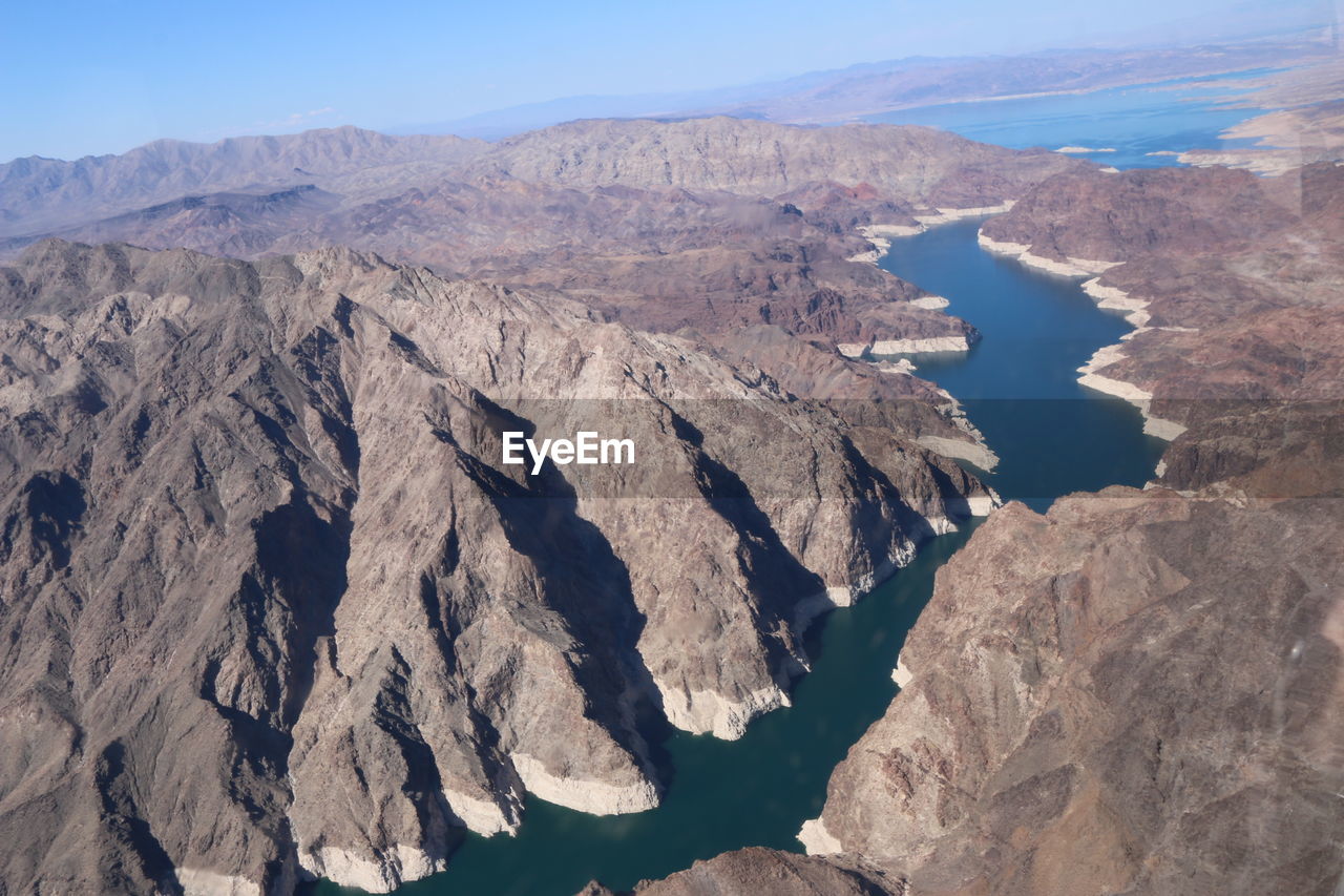 High angle view of river amidst rocky mountains