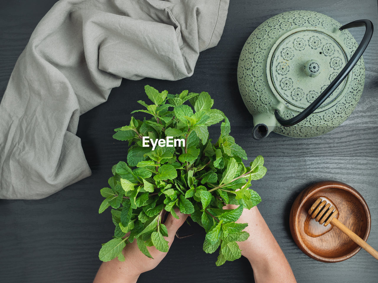 HIGH ANGLE VIEW OF COFFEE CUP ON TABLE AT RESTAURANT