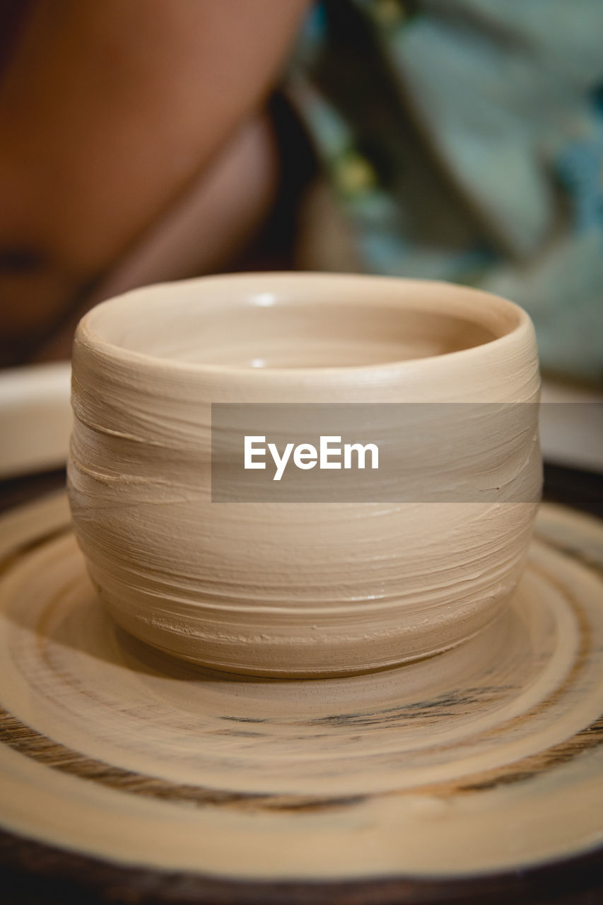 Close-up of coffee cup on table