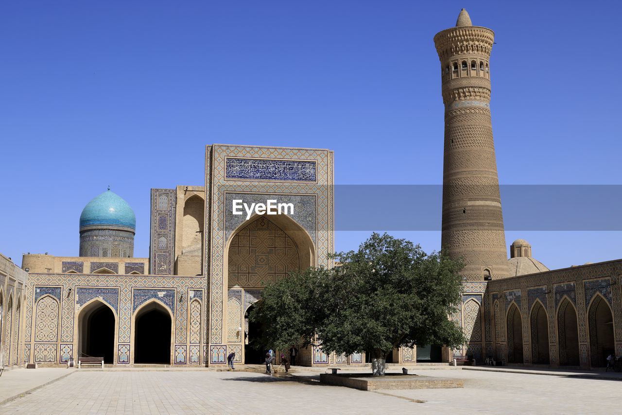 low angle view of historical building against clear blue sky