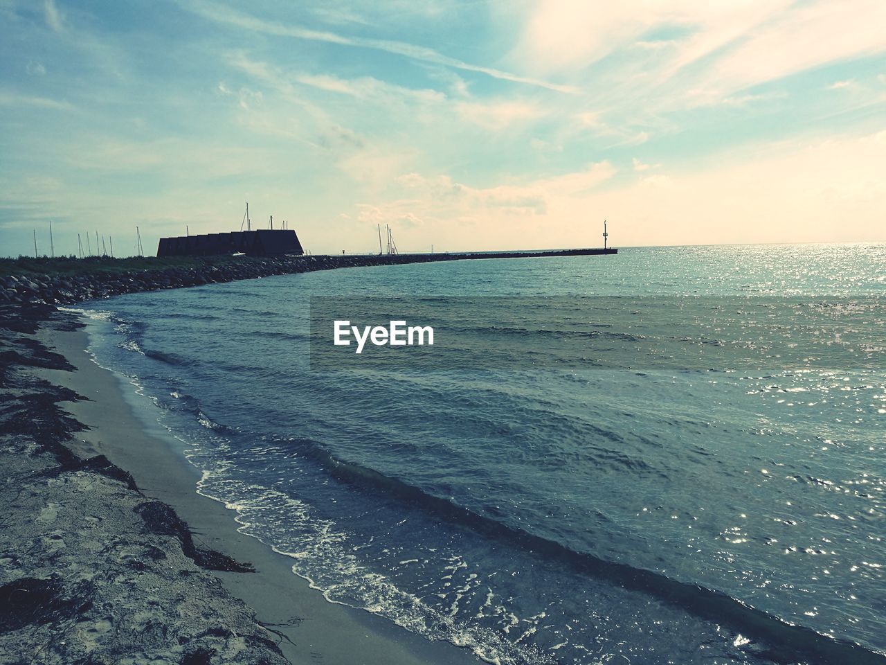 Scenic view of sea against sky during sunset