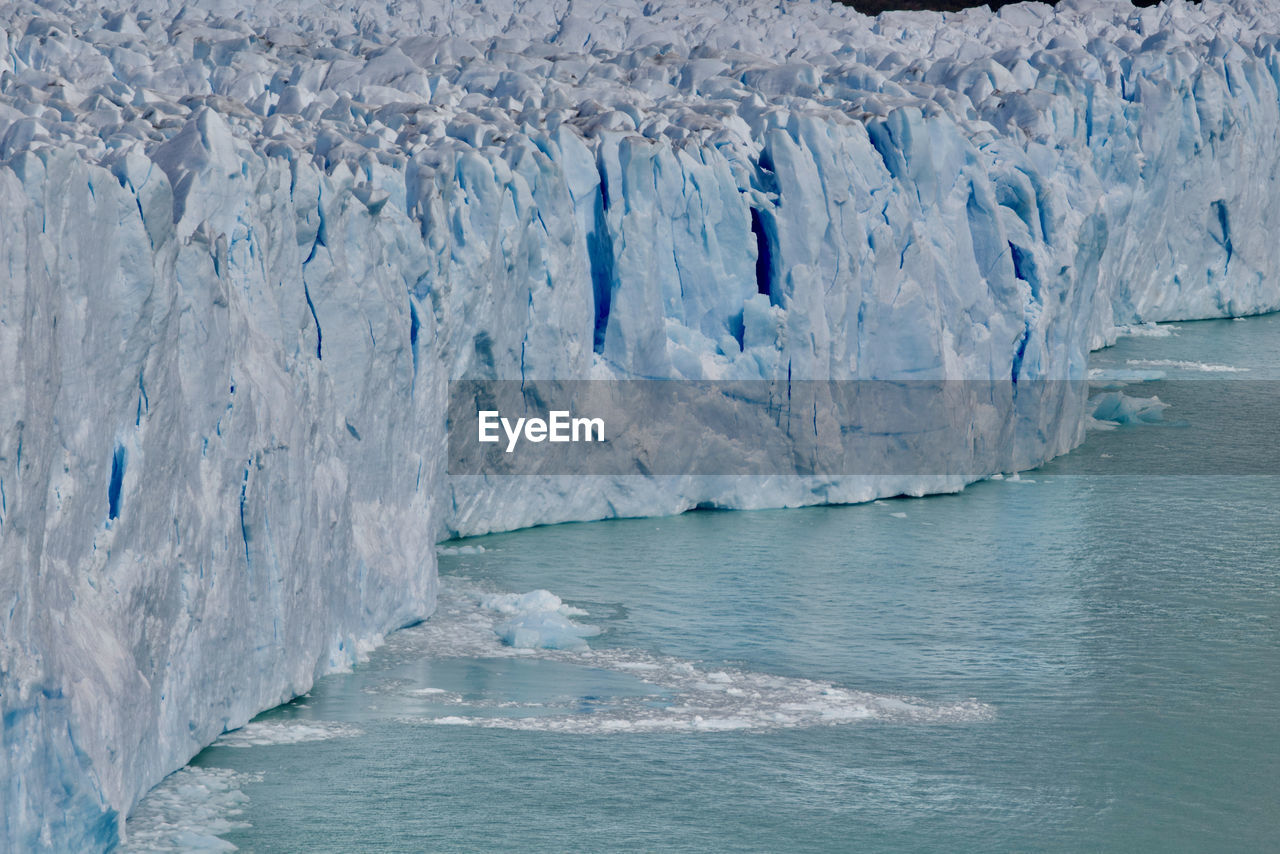 Scenic view of glacier against sky