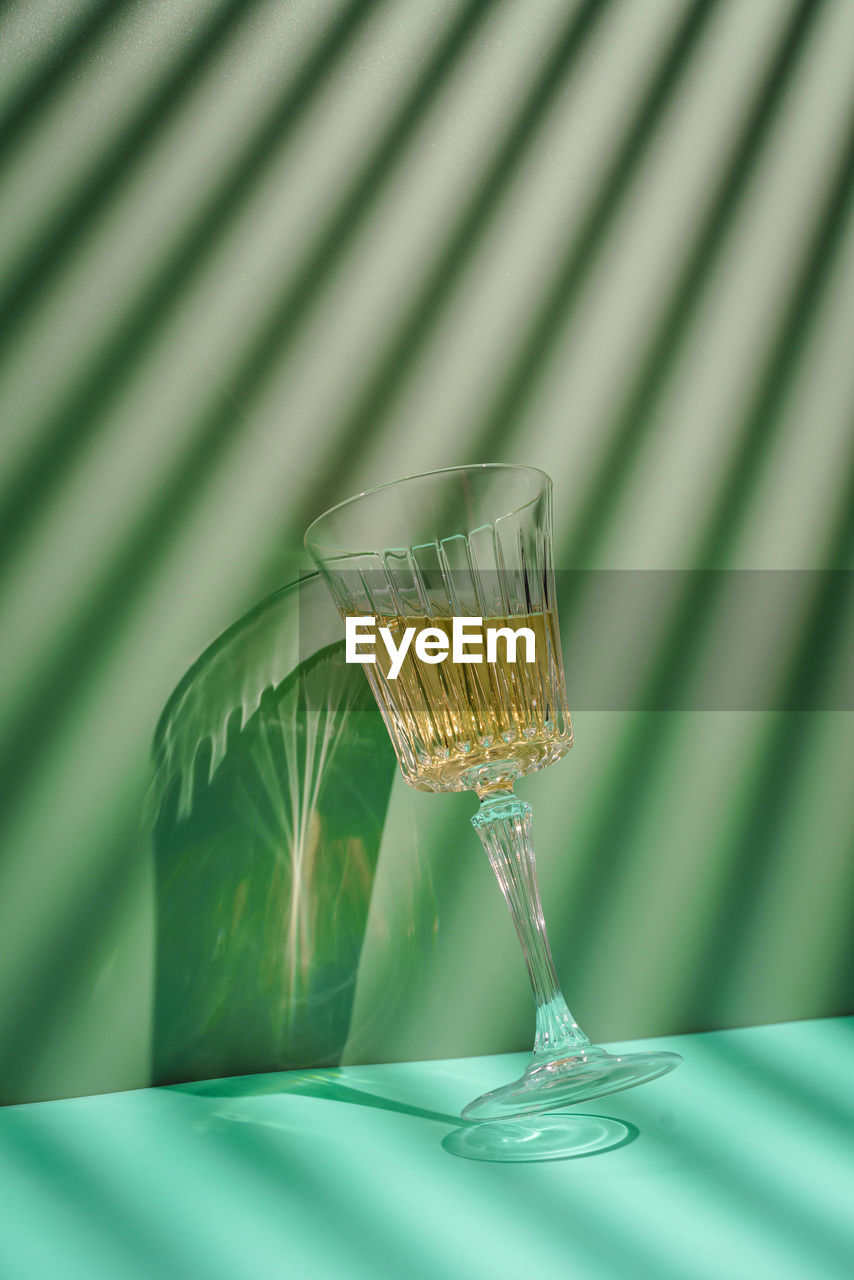 Close-up of beer glass on table